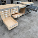 Verrijdbare werkbank met afkortzaag